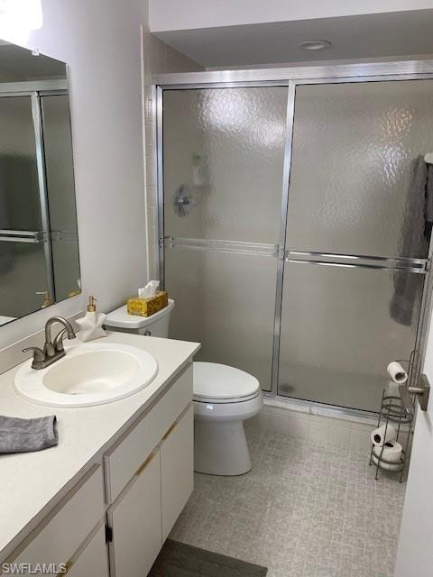 The Master bath has single sink vanity and walk-in shower.