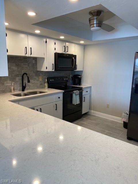 Newly updated Kitchen has quartz counter tops, recessed lighting and plenty of cabinet space.