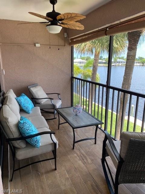 The private screened balcony has tiled flooring and a lighted ceiling fan to enjoy your "Piece of Paradise" outdoors!