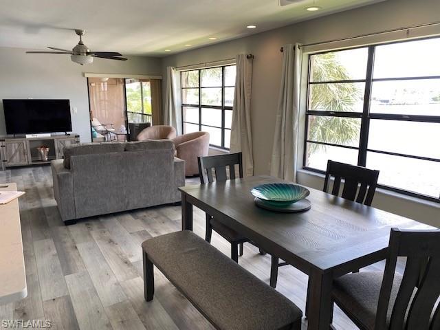 The Dining area also has great water views, plenty of table space and is adjacent to the Kitchen counter bar.