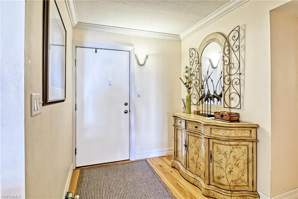 Ensuite bathroom featuring a stall shower and tile patterned flooring