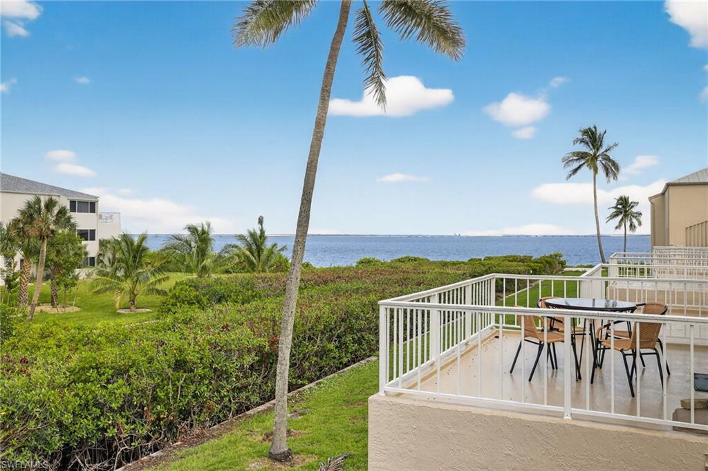 View of patio with a water view