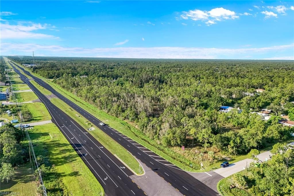 Aerial overview of property's location featuring a forest