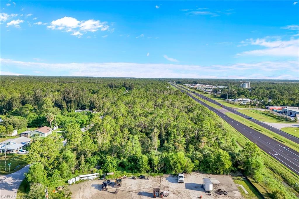 Aerial overview of property's location with a forest