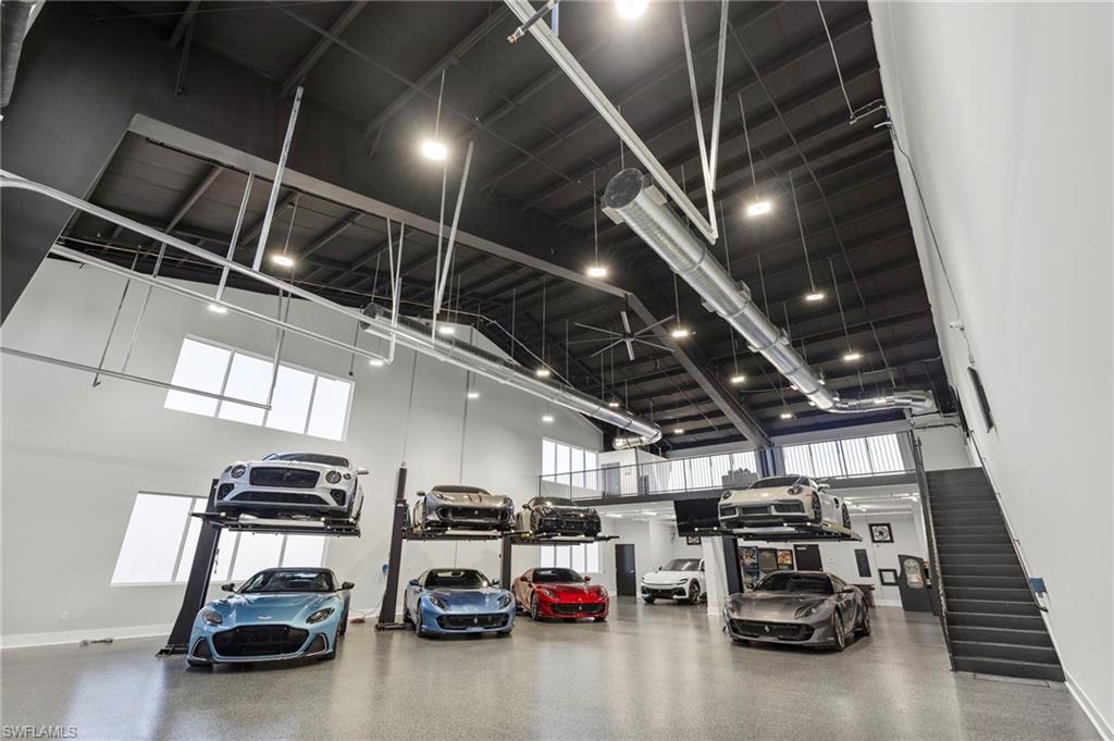 Garage featuring baseboards