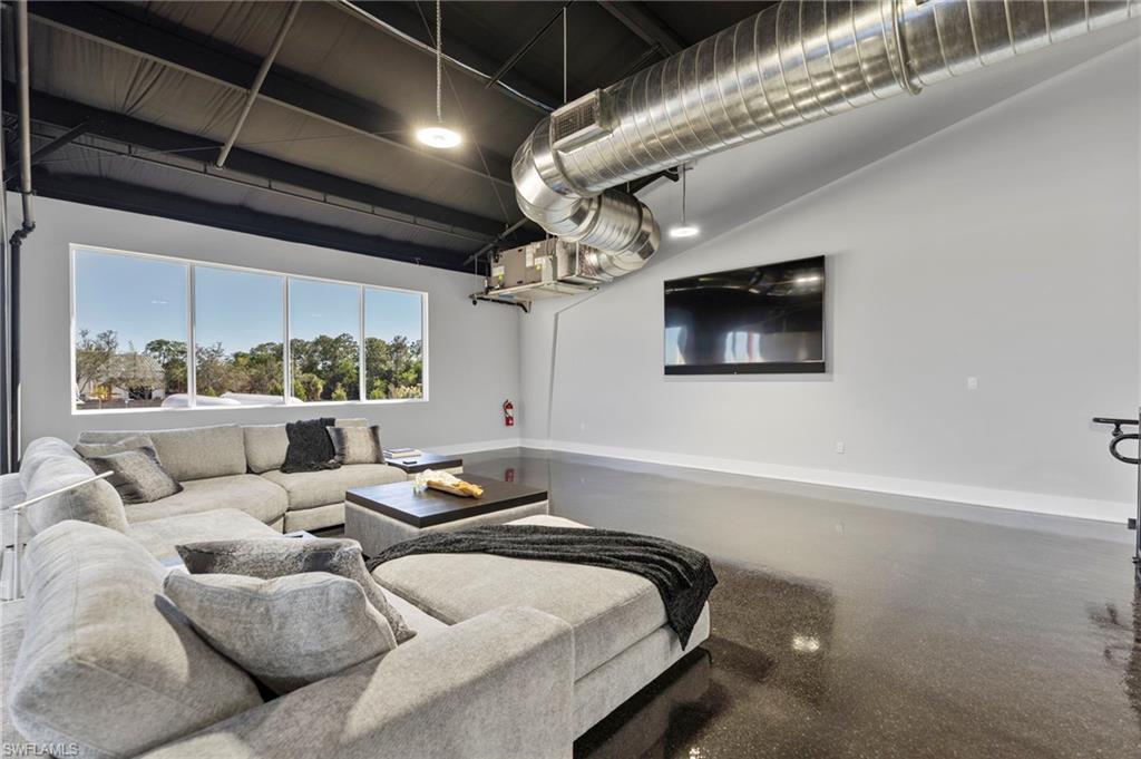 Living area featuring baseboards
