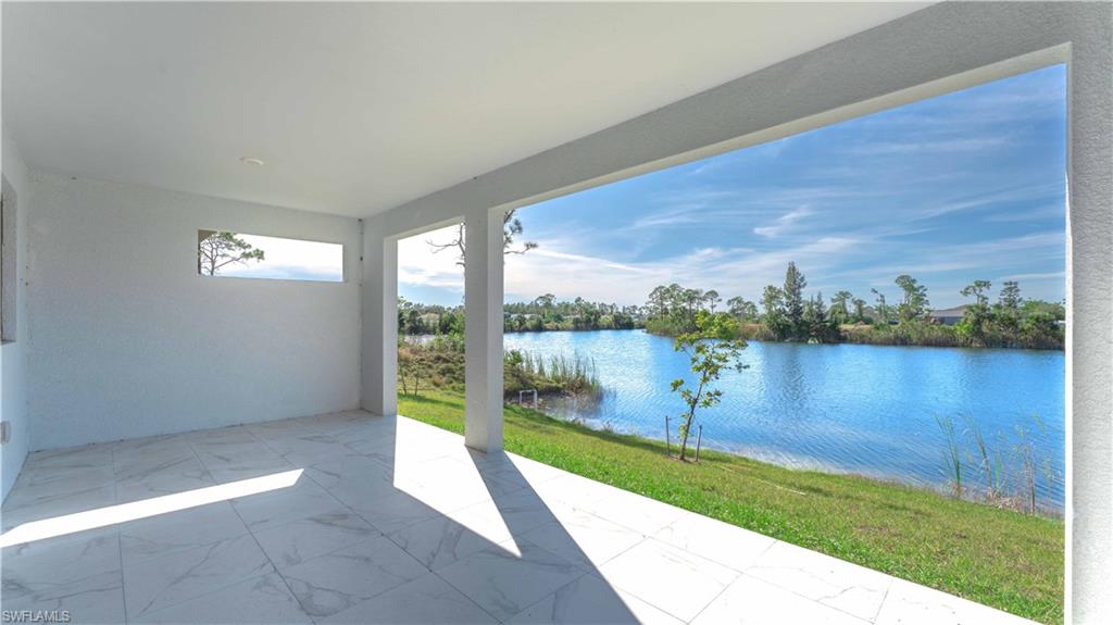 View of patio / terrace featuring a water view