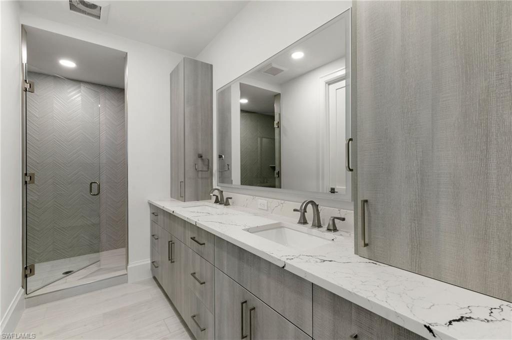 Double sinks with custom cabinates