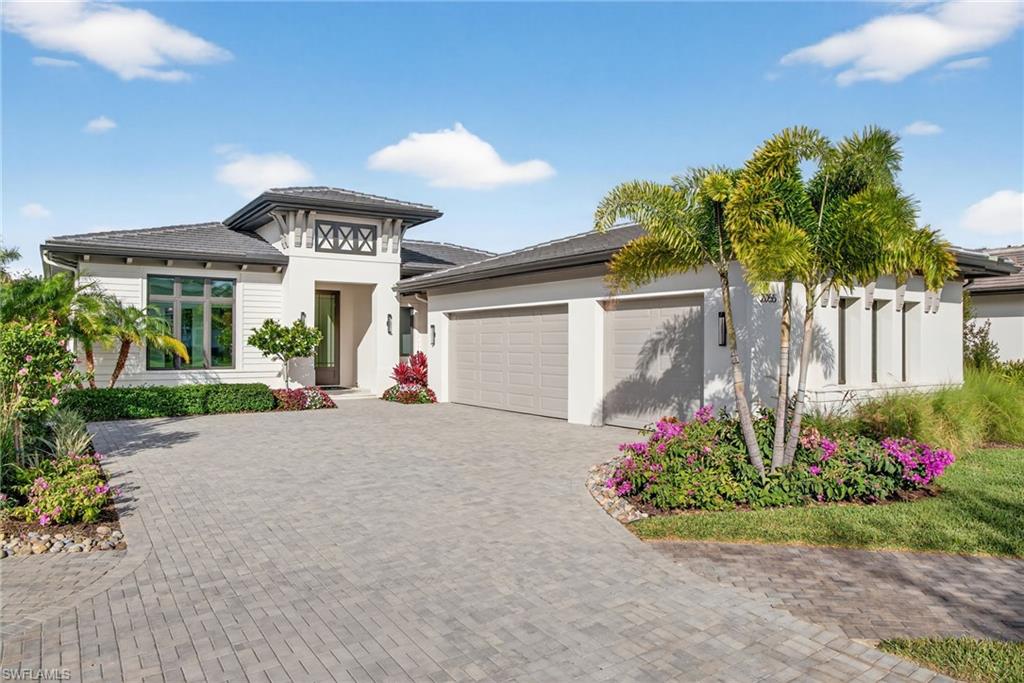 Front view of this boutique home located in the private gated community of Cambridge Park at Orange Blossom