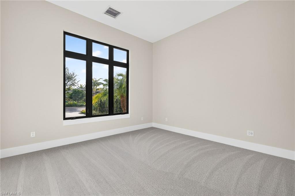 Bedroom 2 light colored carpeting natural lighting for a bright and airy space