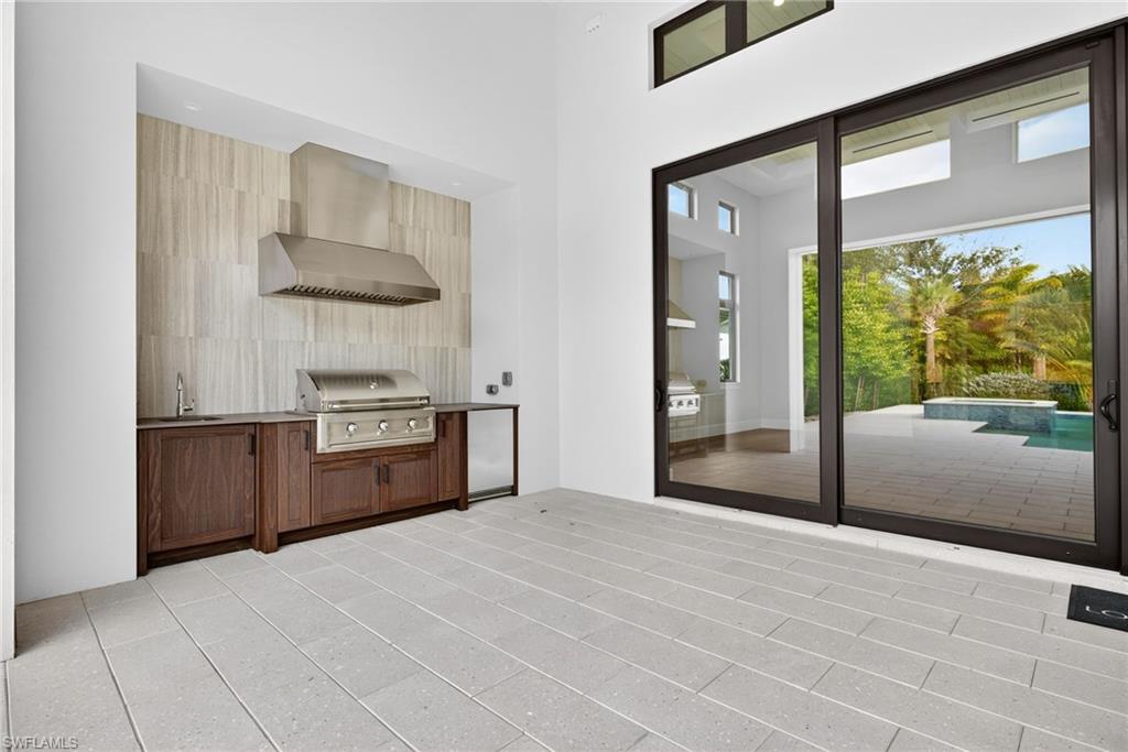 patio / terrace with area for grilling and dining