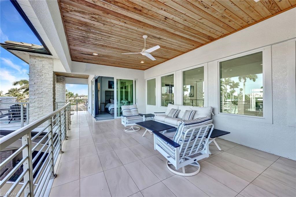 2nd master suite sliders open up to multiple waterfront balconies