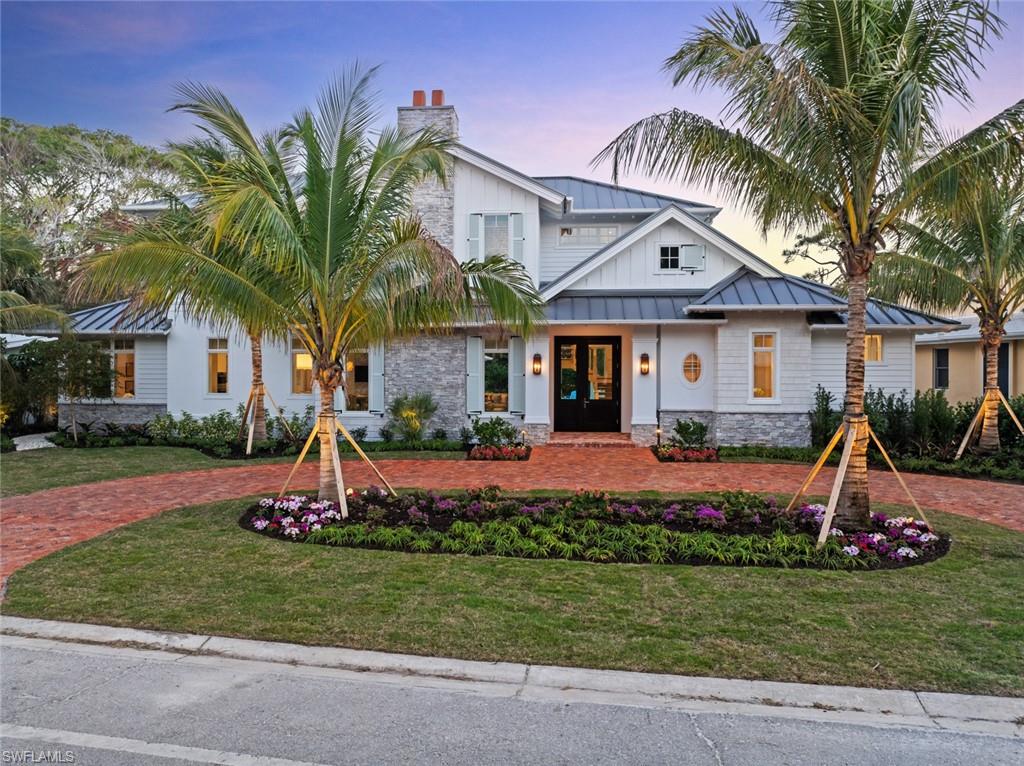 View of front of house with a yard