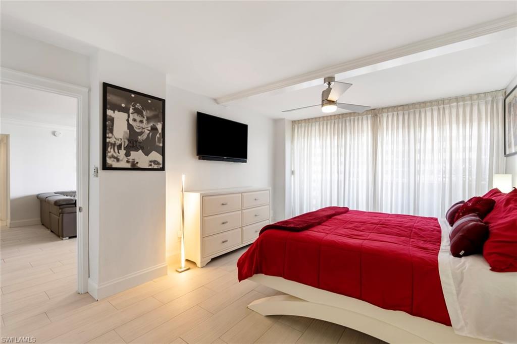 Bedroom featuring light hardwood / wood-style floors and ceiling fan