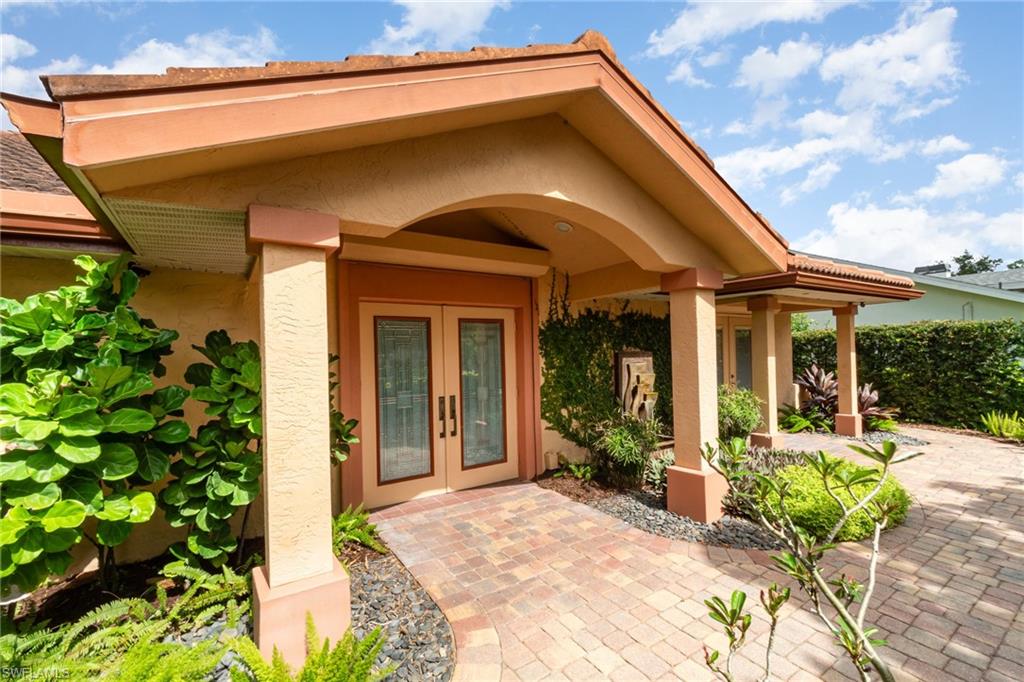 Entrance to property featuring french doors
