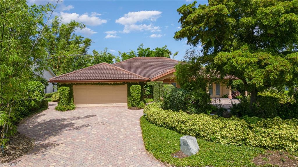 View of front of home with a garage