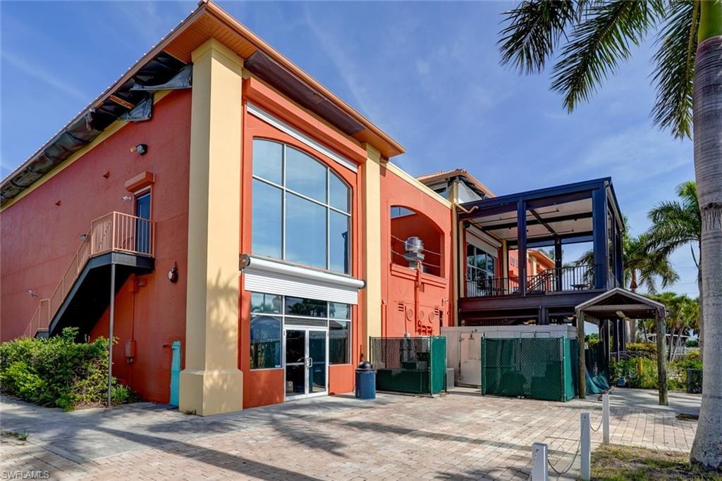 Rear view of house with a balcony
