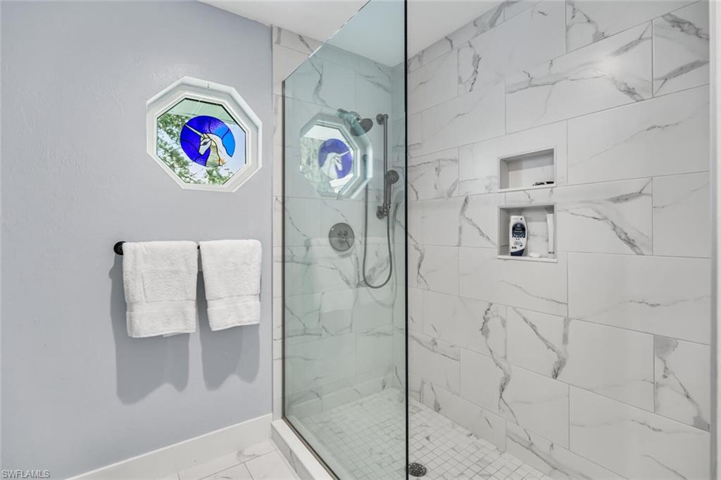 Owner's Suite Bathroom with walk-in shower.  Commode and bidet also here.
