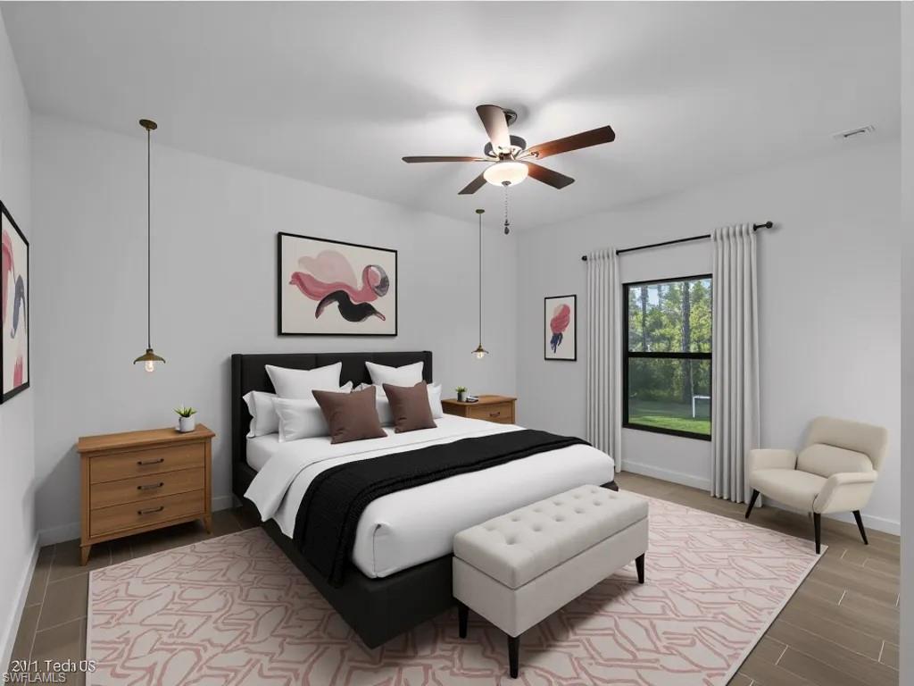 Virtually staged Bedroom featuring a ceiling fan and wood finish floors