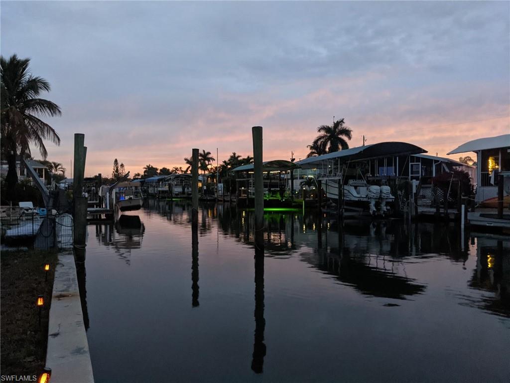 Water view with a dock