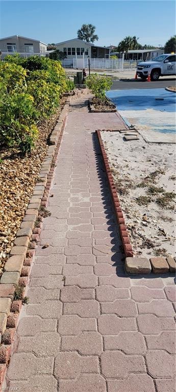 Paved walkway from the canal to the street