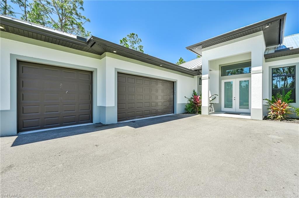 Garage featuring french doors