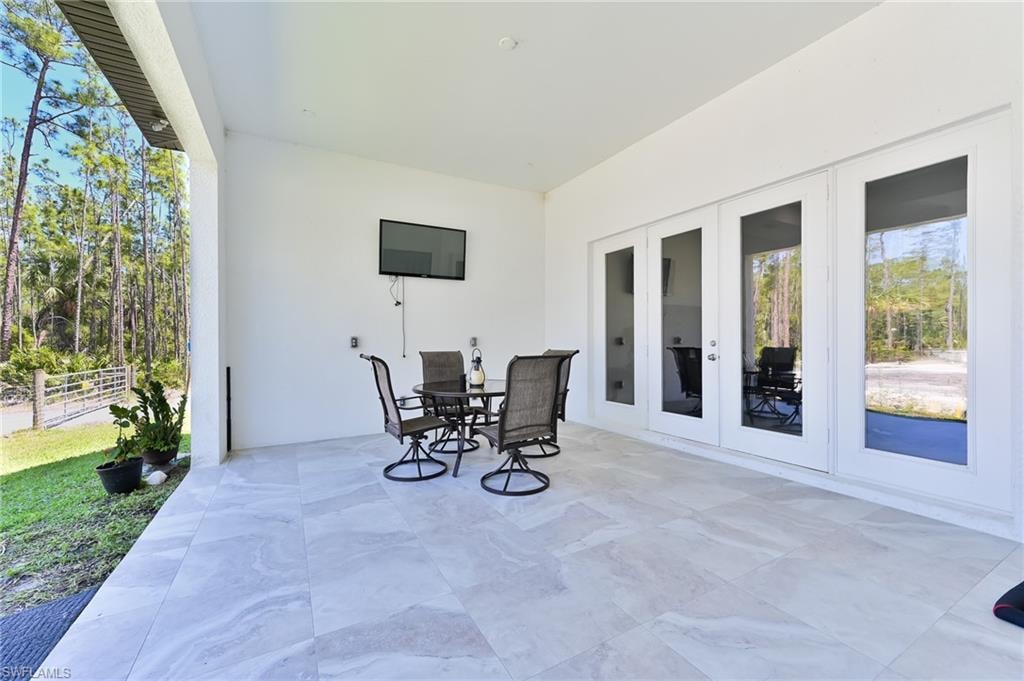 View of terrace featuring french doors