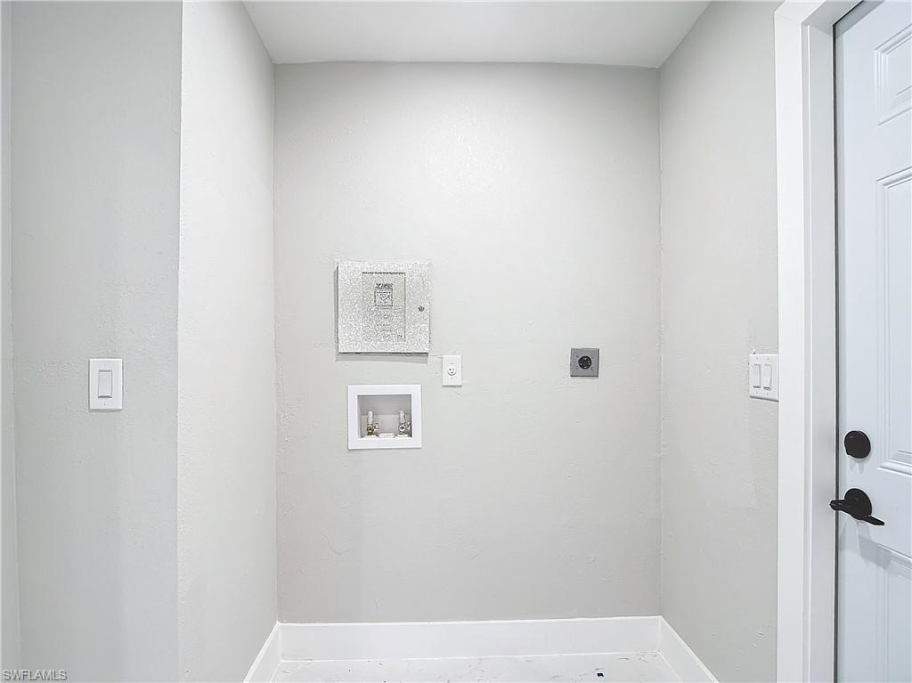 Laundry area with hookup for a washing machine and electric dryer hookup