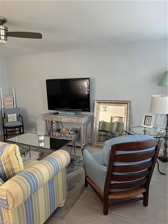 Living room featuring ceiling fan