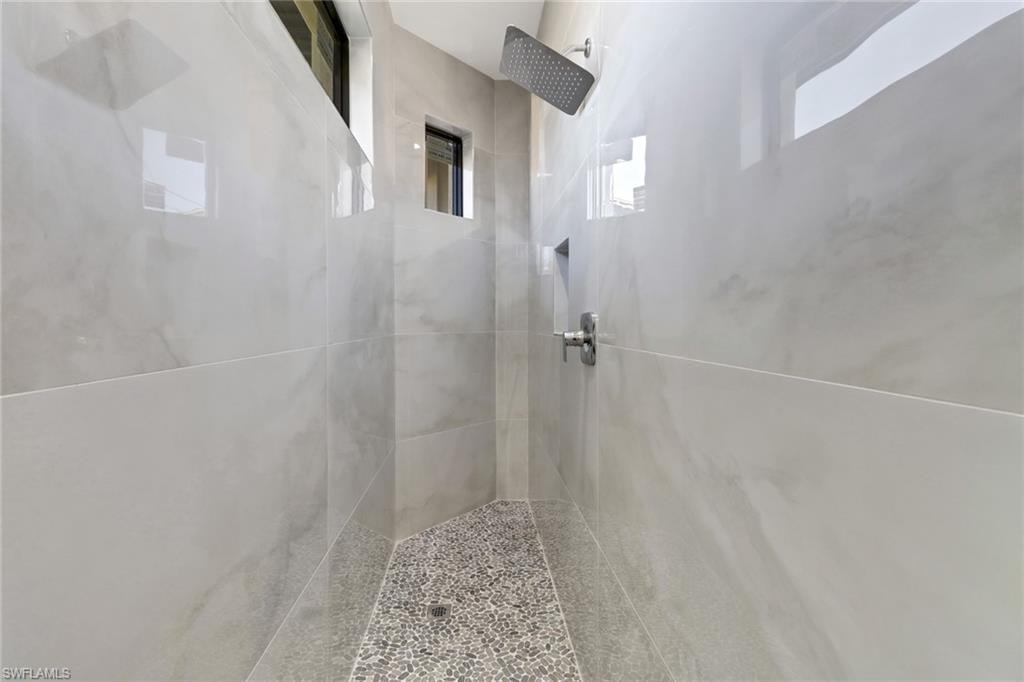 Bathroom with a tile shower