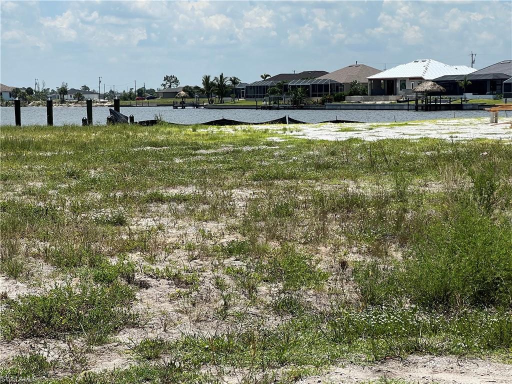 View of Body of water across street from lot where new homes being built