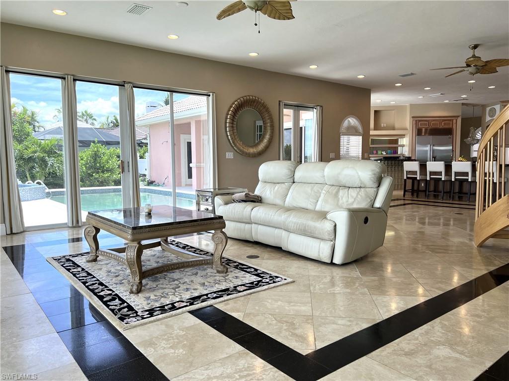 Family Room opens onto the pool deck.  Very light and comfortable