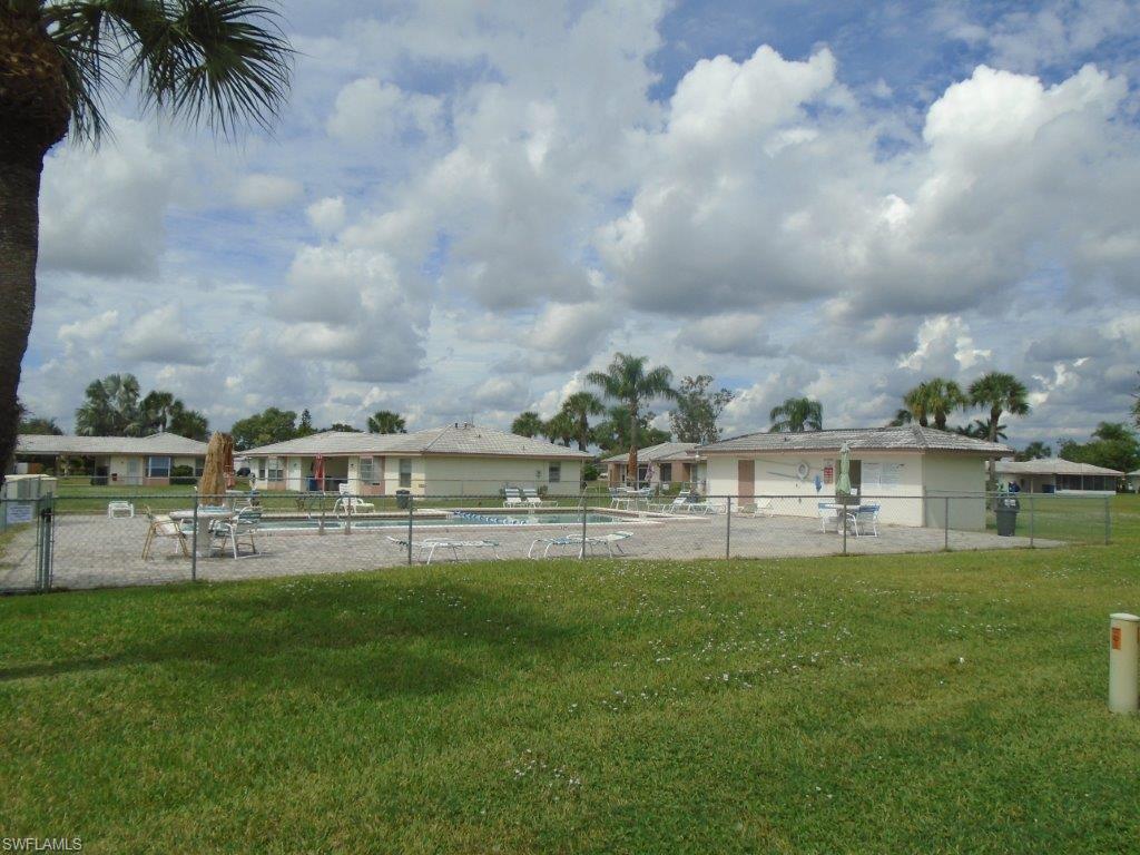View of yard featuring a community pool