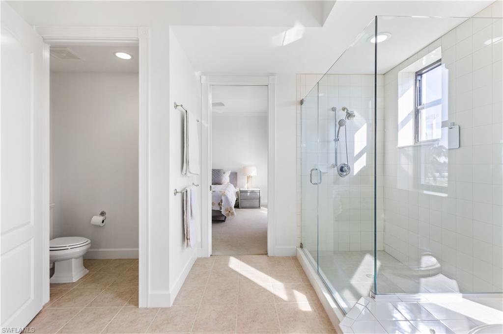 Ensuite primary bath has a private water closet.