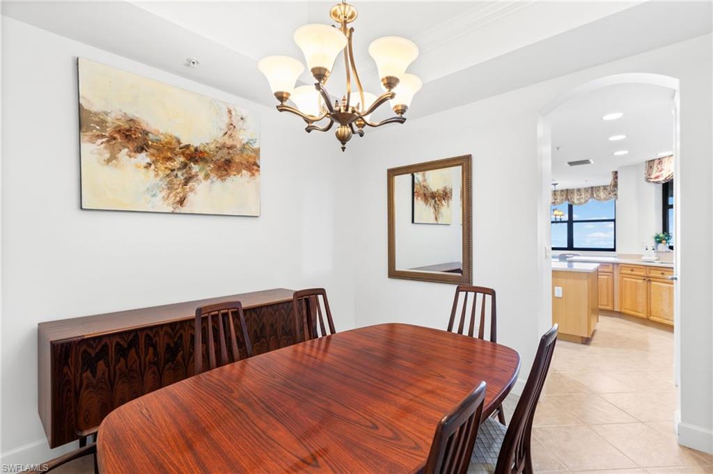 Formal dining area flows beautifully from the kitchen area. Easy serving!