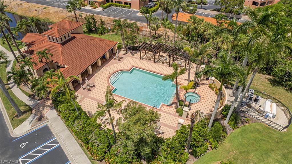 Palmas Del Sol pool, spa, clubhouse and BBQ area. This makes Palmas Del Sol very desirable with these amenities! No other community inside Gulf Harbour offers all of these amenities!