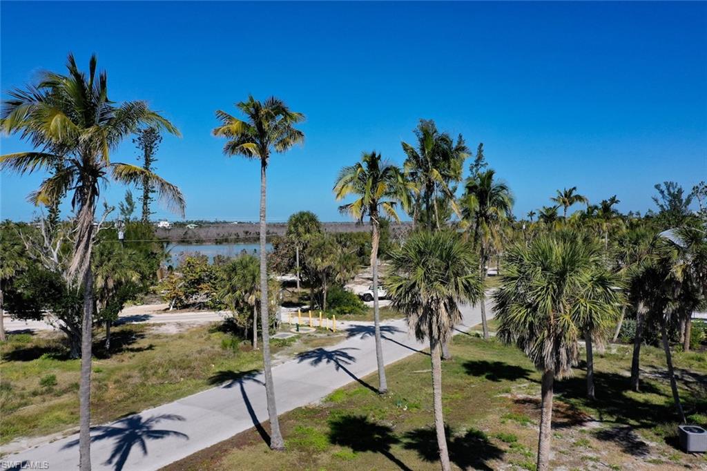 Surrounding community featuring a water view
