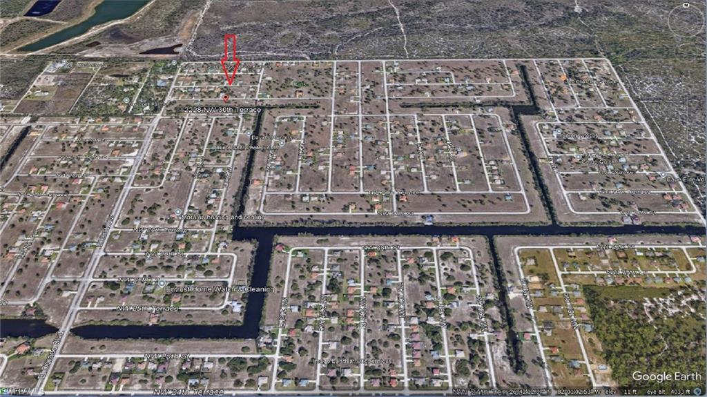 Aerial Northward view of navigable canal sytem to subject lot