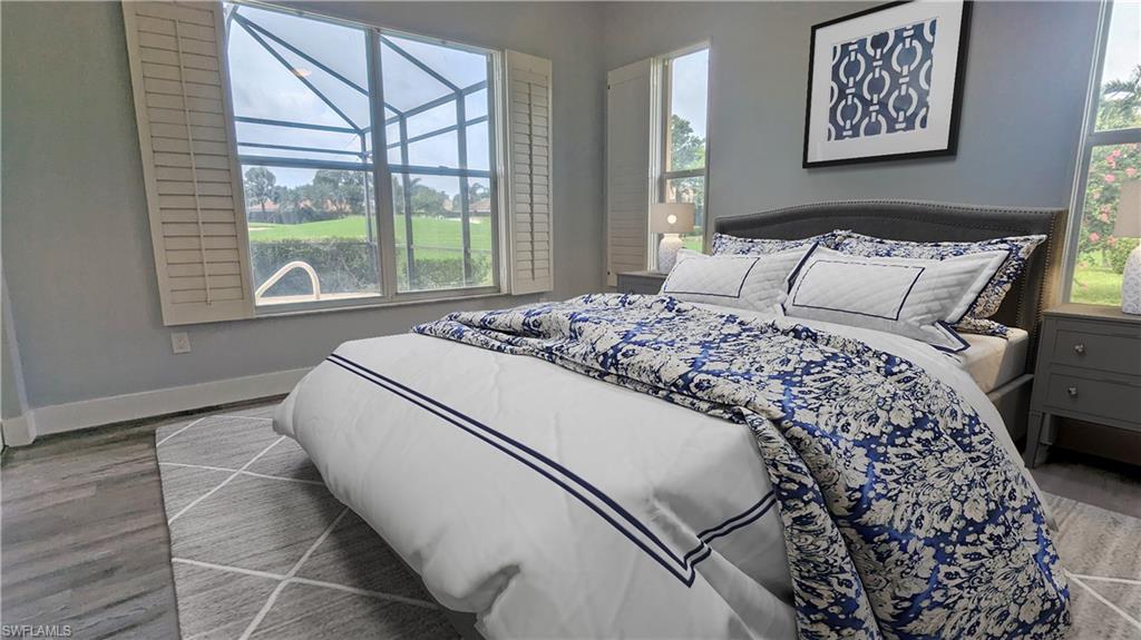 Bedroom featuring multiple windows and wood-type flooring