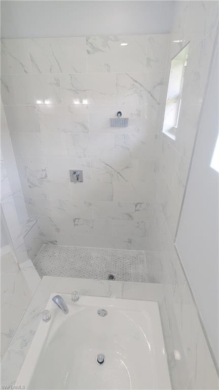Bathroom featuring a tub
