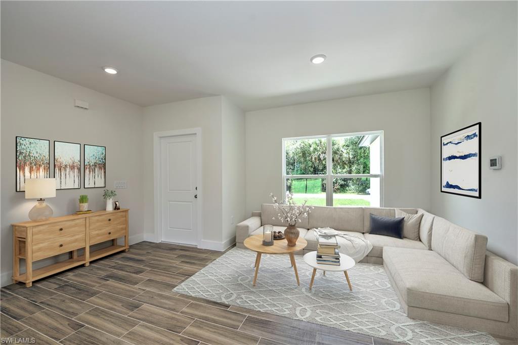 Living room featuring hardwood / wood-style flooring