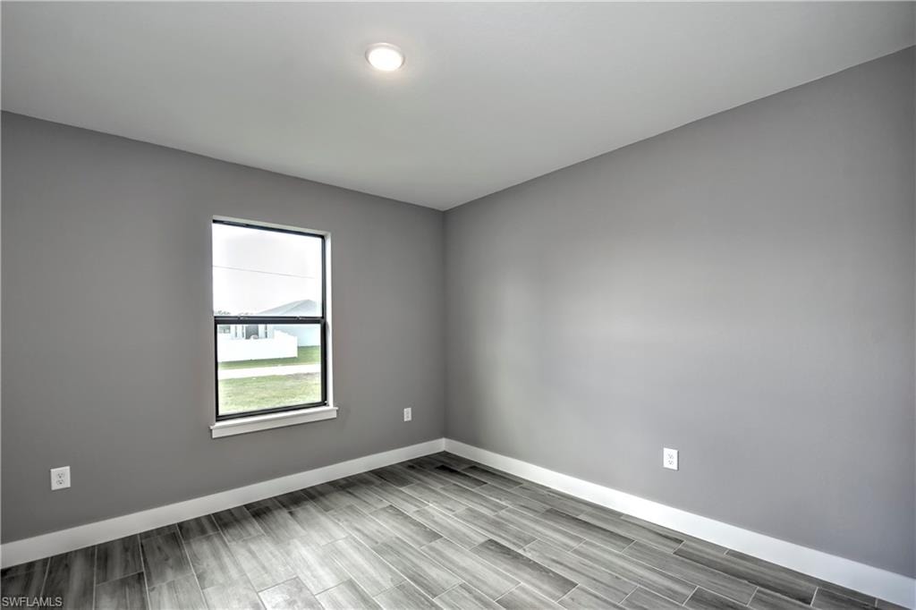 Empty room featuring light hardwood / wood-style flooring