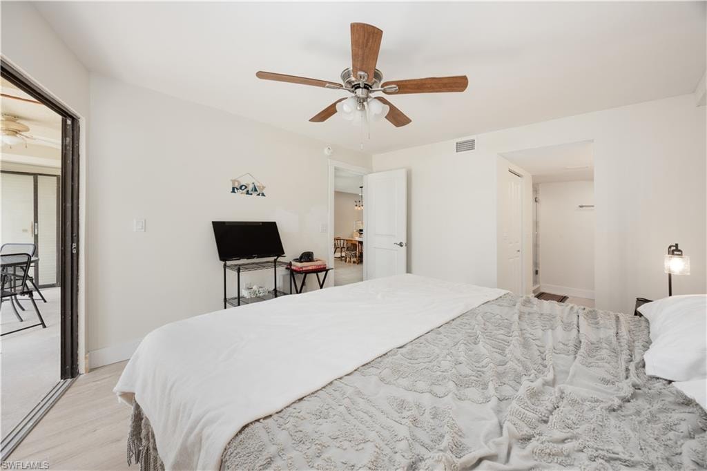 Bedroom featuring light hardwood / wood-style flooring and ceiling fan