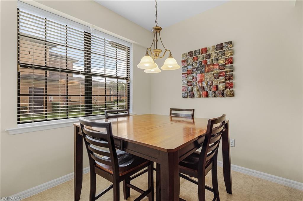 Dining space featuring a notable chandelier