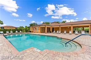 View of pool with a patio area