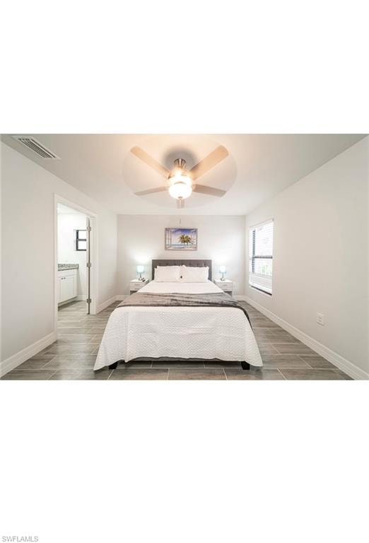 Bedroom featuring ceiling fan and light wood-type flooring