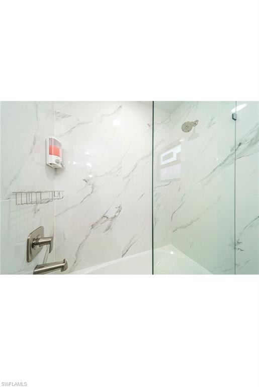 Bathroom with tiled shower