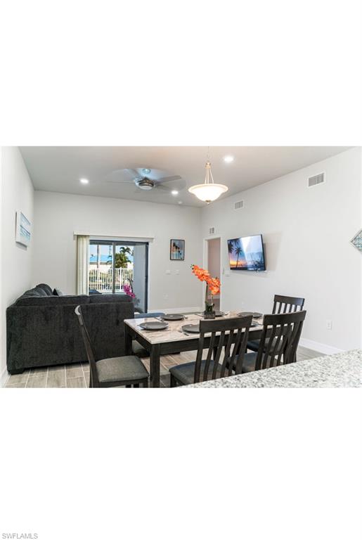 Dining space featuring ceiling fan