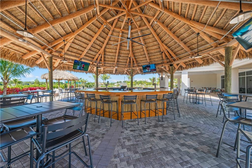 View of patio / terrace with an outdoor bar and a gazebo