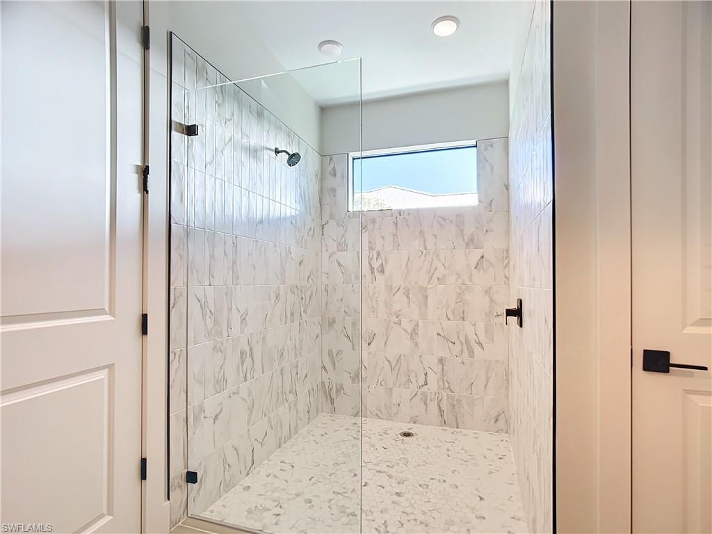 Bathroom featuring walk in shower